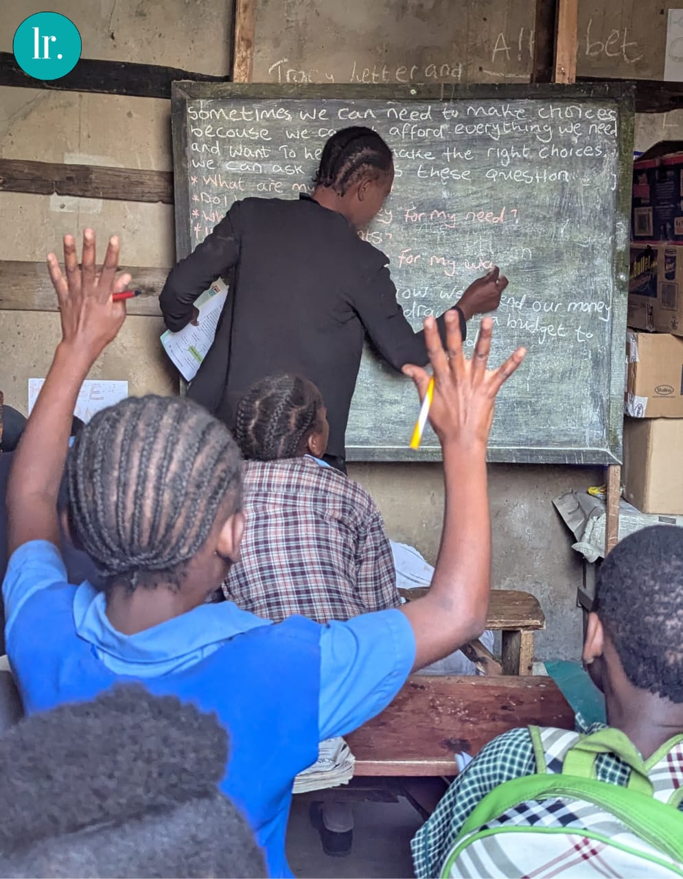Teacher at blackboard