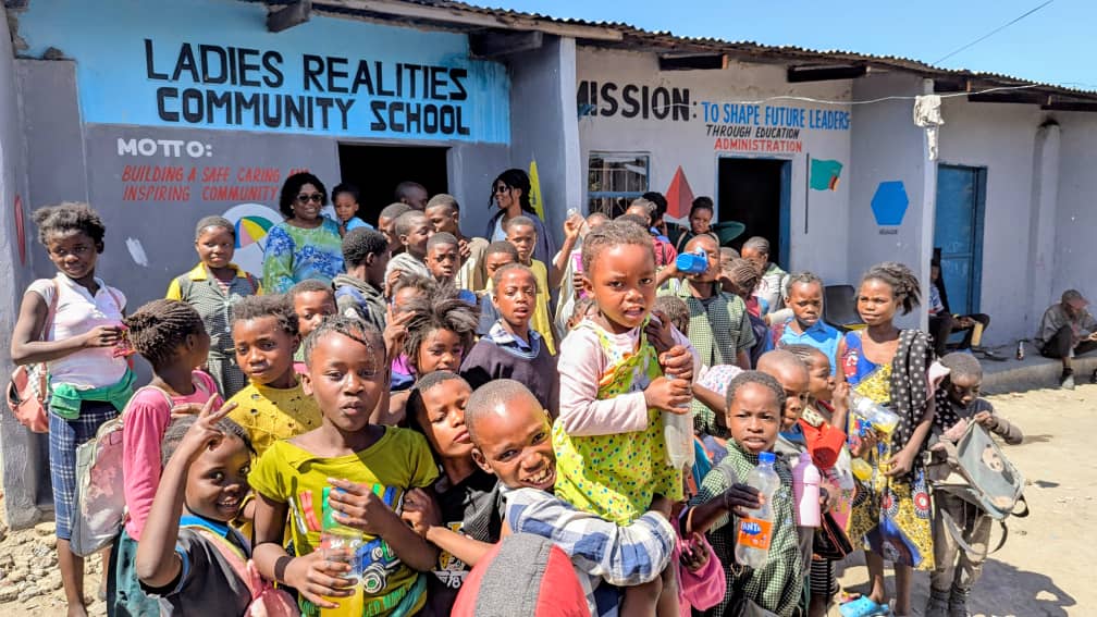 Students outside Ladies Realities Community School
